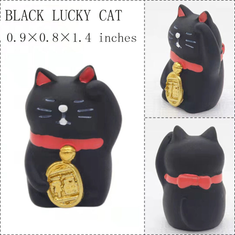 Miniature-black-lucky-cat attracting good fortune.